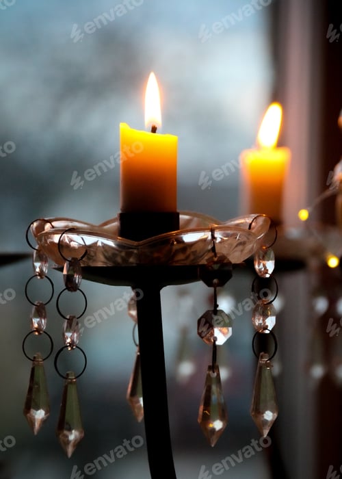 Preview: Home cosy feeling with candles in fading daylight, home interior decoration, soft tones