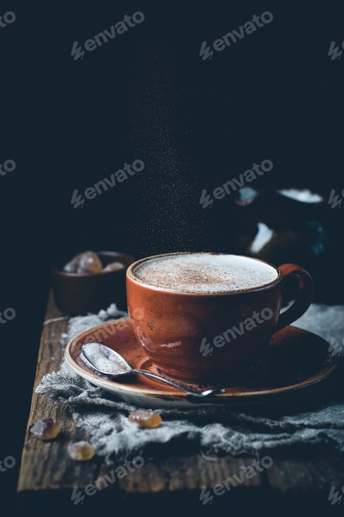 Preview: cup of cappuccino with cinnamon