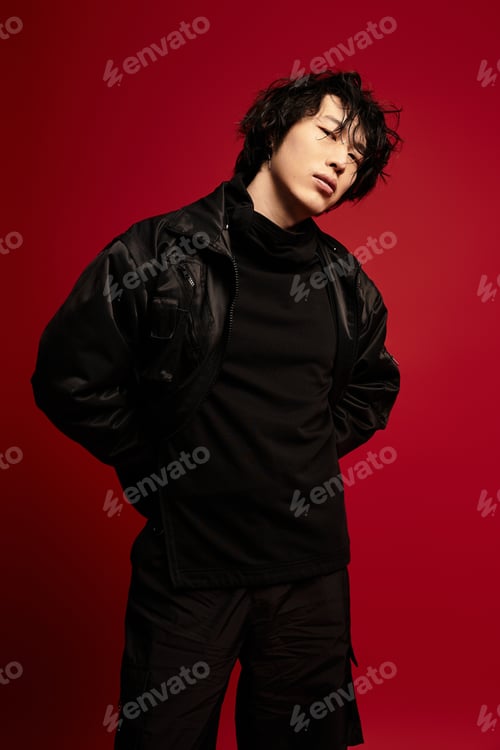 Preview: Urban melancholy portrait of stylish asian man in studio