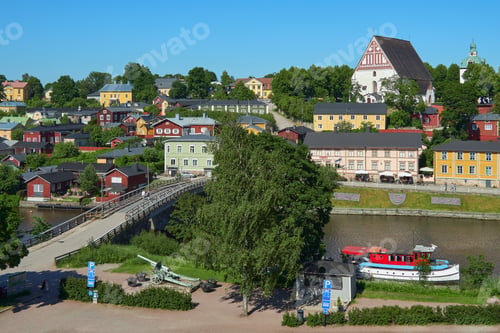 Preview: Panorama of small town in Finland in summer near river with bridge old medieval church.