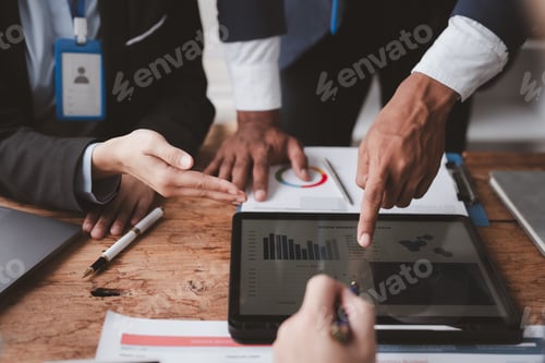 Preview: Business people meeting explaining the financial graph data and marketing plan.