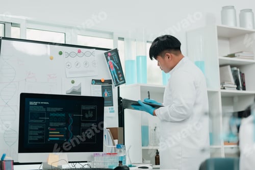 Preview: Scientist examining biological samples under a microscope in medical research laboratory
