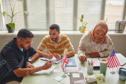 Preview: Young Adult Multiethnic Students Collaborating during Language School Lesson