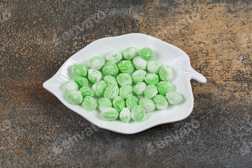 Preview: Green menthol candies on leaf shaped plate
