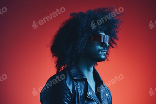 Preview: Portrait of fashion man with curly hair on red background with stylish glasses, multicultural