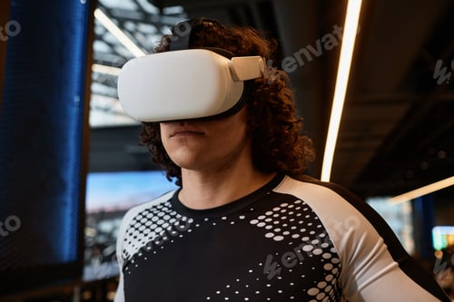 Preview: Man Wearing VR Gear During Sports Workout in Gym