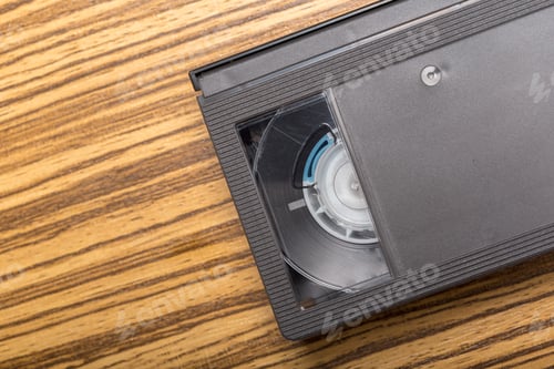 Preview: video tape cassette over wooden background