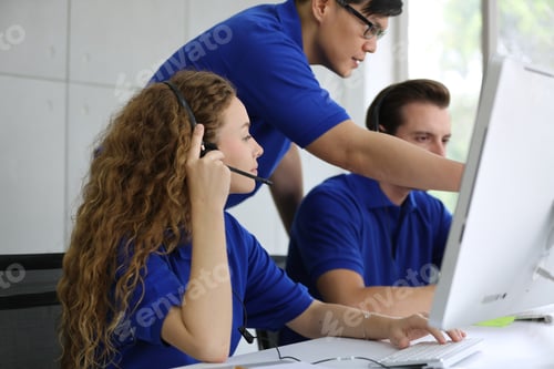 Preview: Smiling Woman In Headset Working In Call Center Office