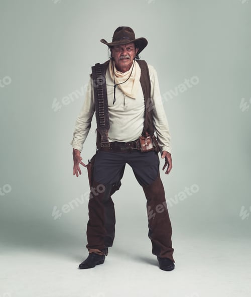 Preview: Lets draw. A cowboy looking confrontational while isolated on gray.