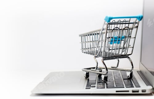 Preview: Online shopping concept with supermarket trolley