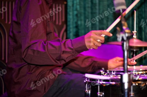Preview: Black diverse musician drummer with purple shirt