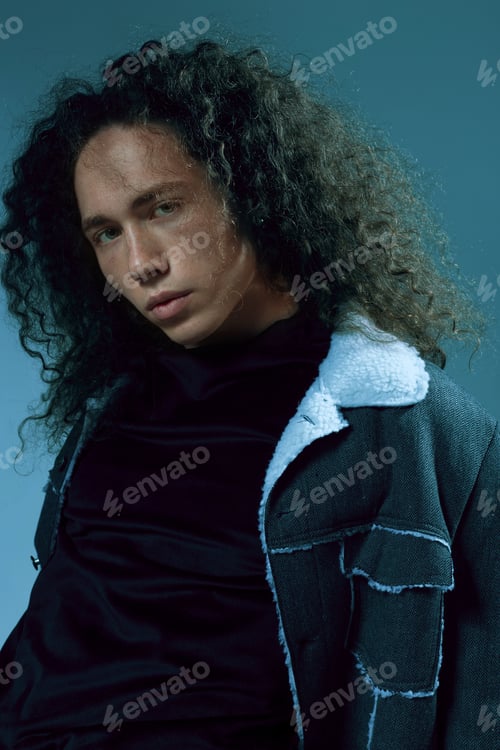 Preview: Portraits Of A Guy With An Attractive Appearance, Curly Hair And Stylish Clothes
