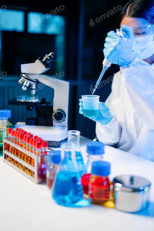 Preview: Biologist taking experiment with plants working in laboratory.