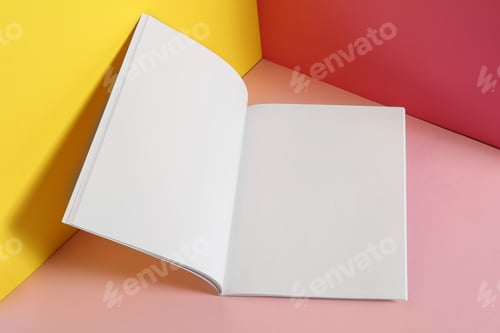 Preview: Empty book pages on color background. Mockup for design