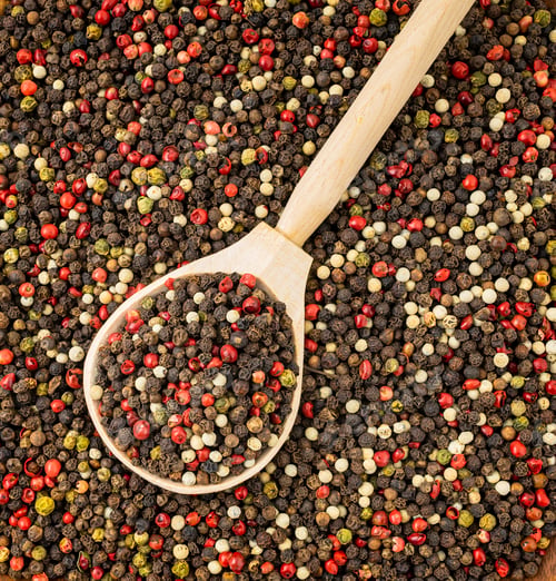 Preview: Five Peppercorn mix five varieties in a wooden spoon for a food background