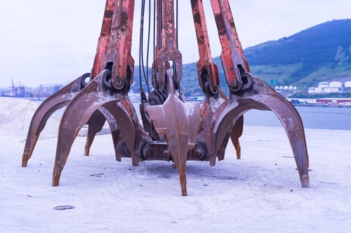Preview: Closeup shot of an old rusty peel grab bucket for crane