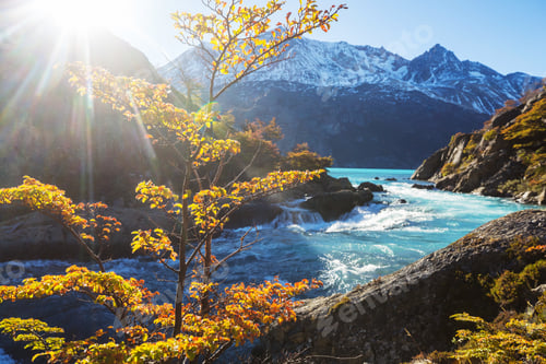 Preview: Mountain River Flowing Past Autumn Trees and Peaks