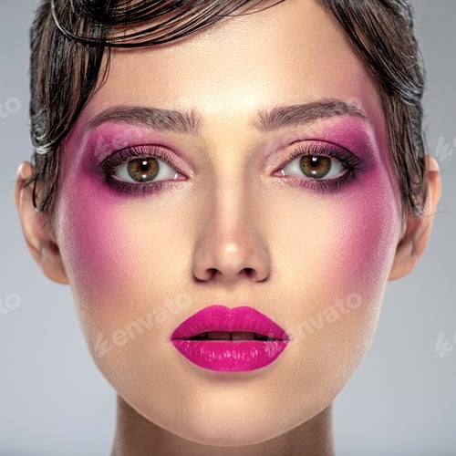 Preview: Beautiful brunette girl with bright eye makeup.