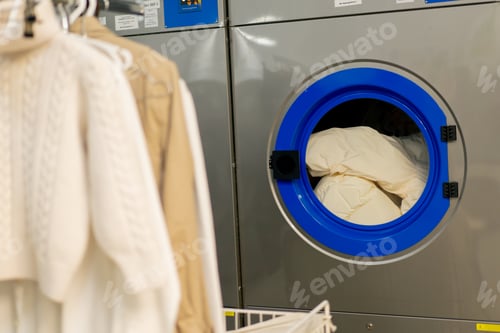 Preview: close up professional dry cleaning washing machine washing process professional delicate equipment