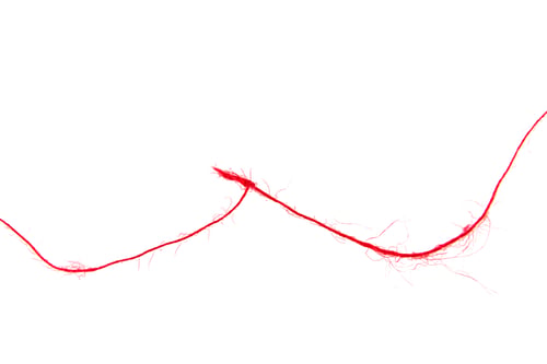 Preview: Threads on a white background. Selective focus.