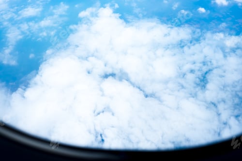 Preview: Aerial view of Blue sky and Cloud Top view from airplane window,Nature background