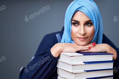 Preview: Muslim female student learning at home