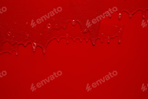 Preview: Cream liquid gel serum flows down red silver texture