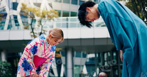Preview: Culture, japanese people and bow for greeting, respect and welcome with kimono in city. Traditional