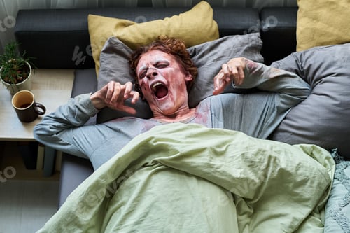 Preview: Red-haired Male Zombie Yawning In Bed