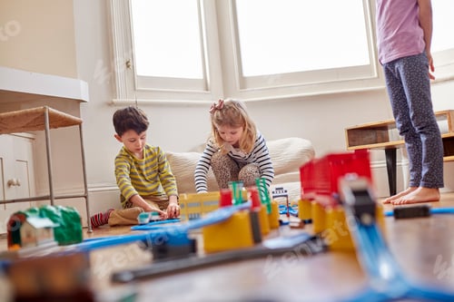 Preview: Kids playing with a toy train at home
