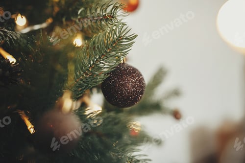 Preview: Christmas tree with ornaments, golden lights in festive room