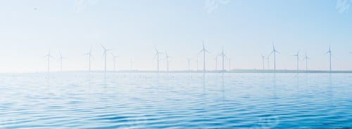 Preview: Green energy. Wind turbine on the seashore. Renewable and natural energy sources.