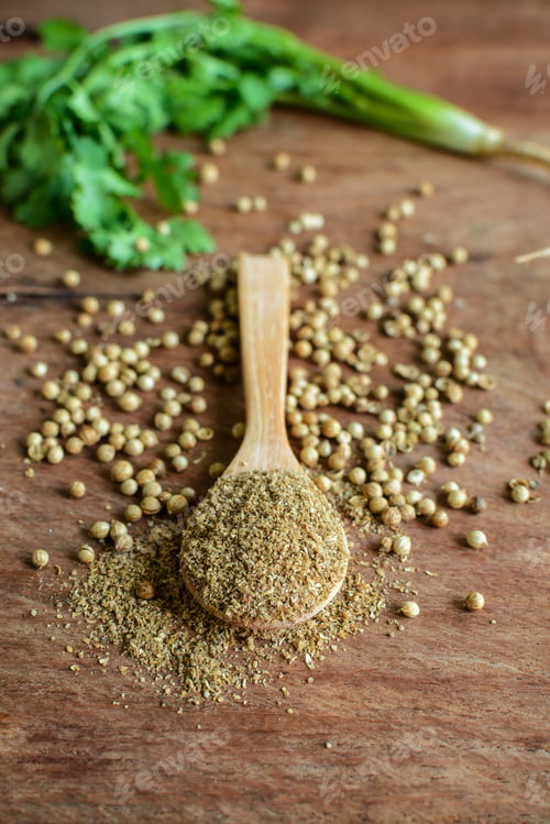 Preview: Coriander powder, Aromatic ingredients on rustic wooden table