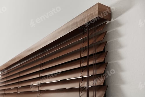 Preview: Modern window with closed stylish wooden blinds indoors, closeup view