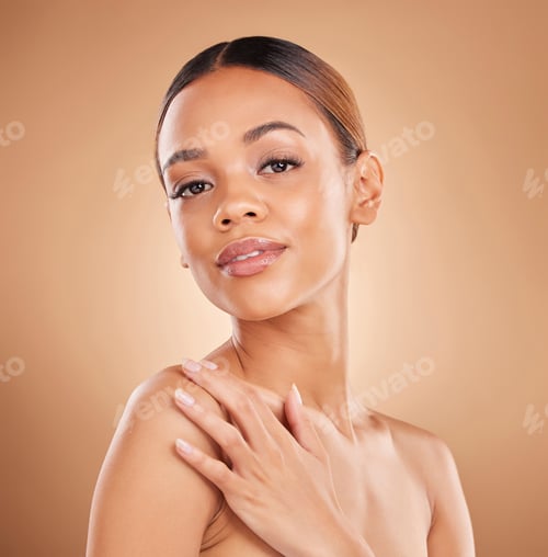 Preview: Beauty, portrait and a woman face with skin care glow and shine in studio on a brown background. Ae