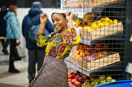 Preview: Afro black women costumer at the market.