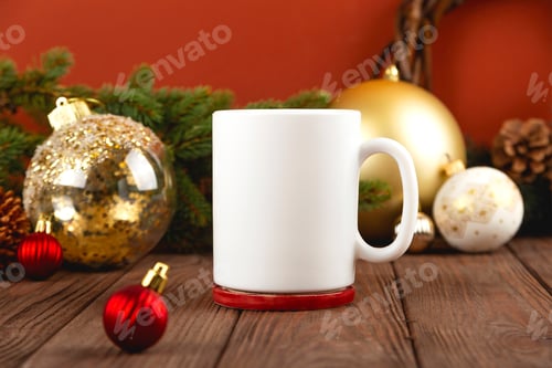 Preview: Christmas mock up of white mug on wooden table with golden festive decorations.