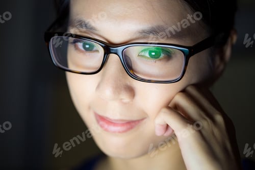 Preview: Woman use tablet at night