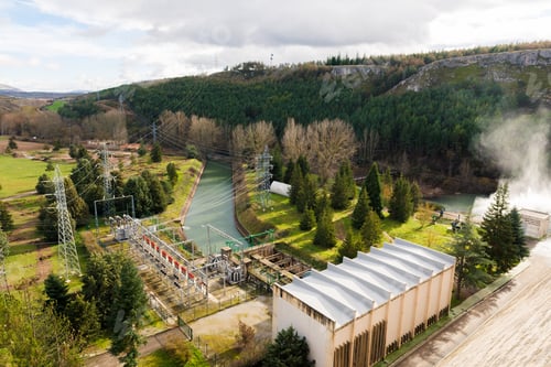 Preview: Contemporary hydroelectric power station in landscape