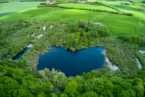 Preview: Green fields and blue skies. Green fields and blue sky in spring and early summer.