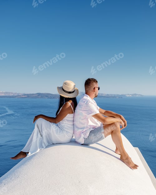 Preview: Couple of men and women on vacation in Santorini Greece, couple visit Oia Santorini