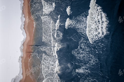 Preview: Snowy beach at Baltic sea. Winter tourism, Poland. Aerial view