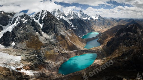 Preview: Huayhuash Mountain Range over the azure lagoons in Peru