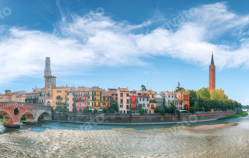 Preview: Fabulous Verona cityscape view on the riverside with historical buildings and towers.