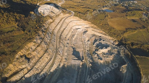 Preview: Panoramic view of quarry. Shot. Top view of picturesque quarry located on coastal mountain near