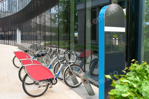 Preview: Payment terminal near parking lot with many bicycles outdoors