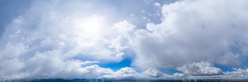 Preview: Dramatic Cloudscape and puffy stormy clouds during sunny day. Nature Panorama Background