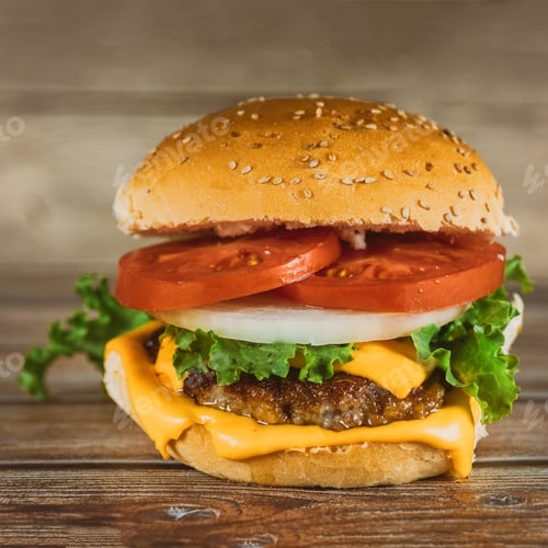 Preview: Fresh colorful homemade hamburger on wooden table. Close up.