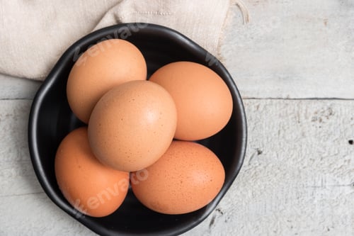 Preview: Eggs in black bowl