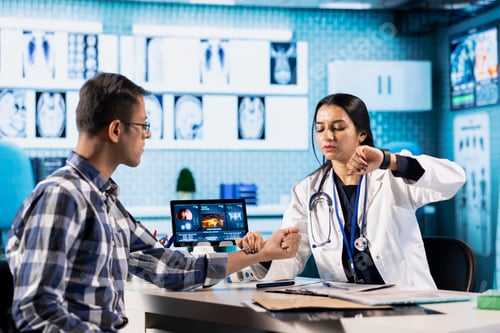 Preview: Medic cardiologist monitoring the heart rate of an indian patient
